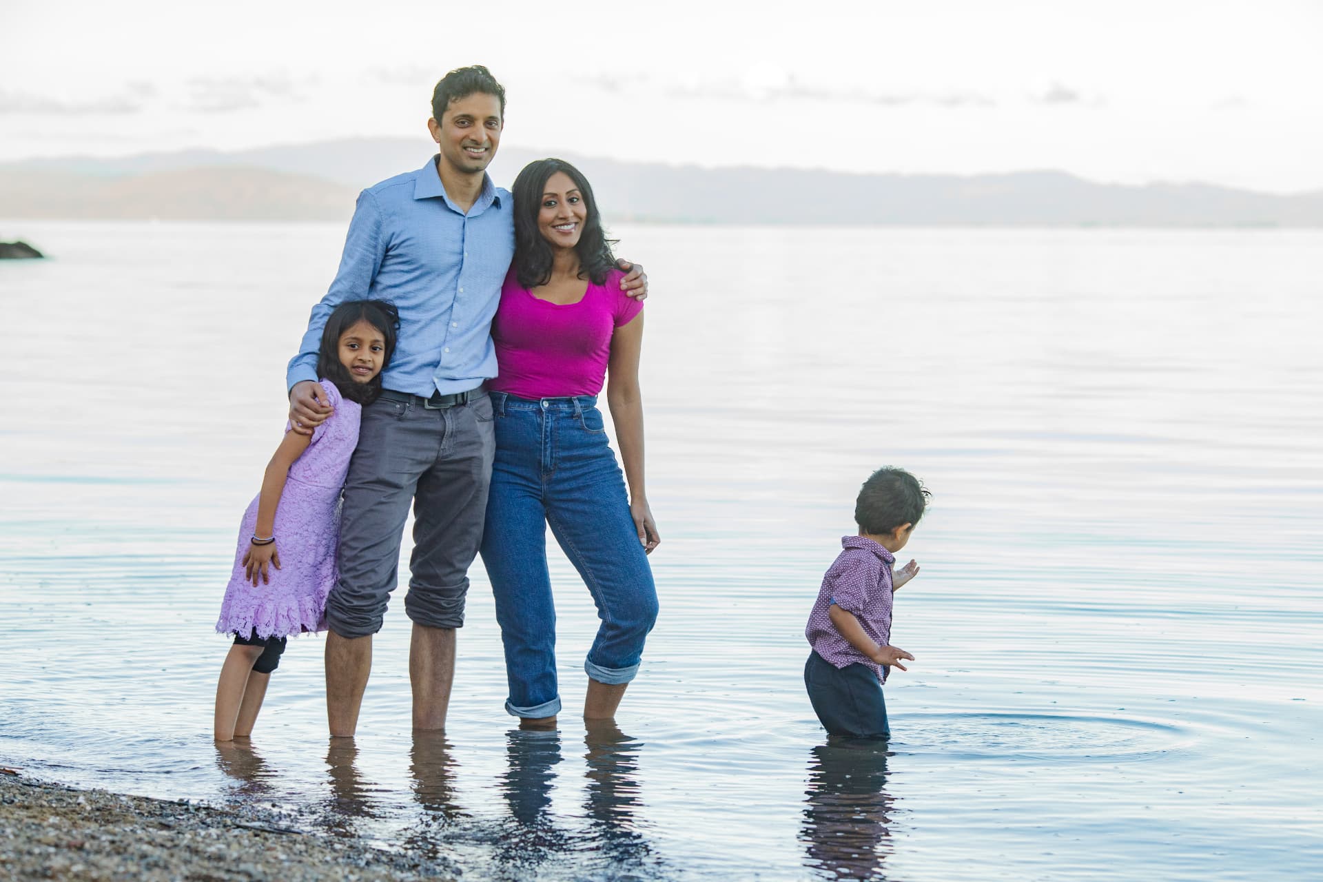 Geetha and her family at the water's edge